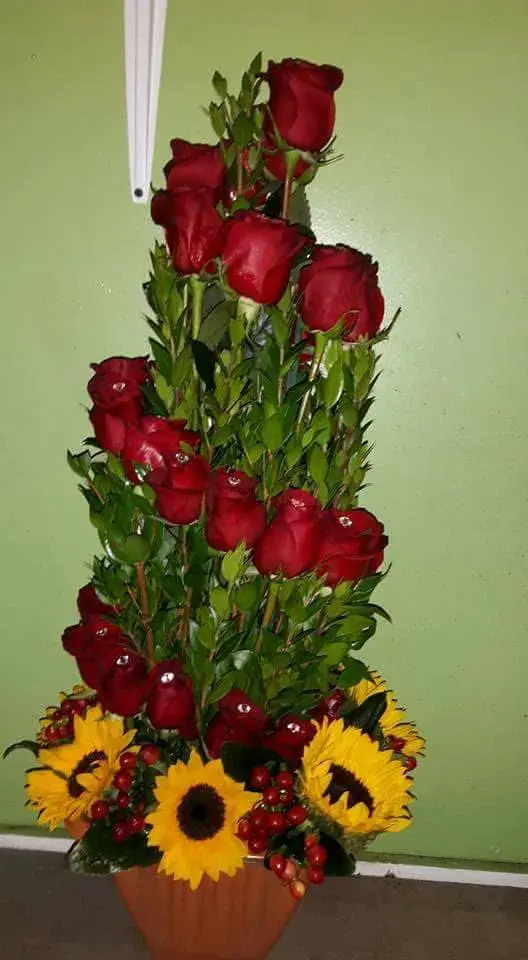 Rose tower with sunflowers at the base